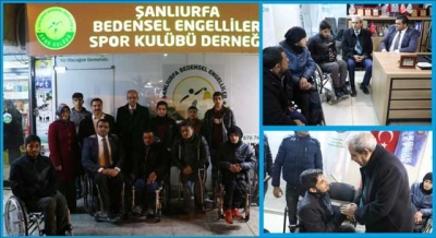 Engelli sporcuya tekerlekli sandalye desteği