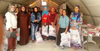Suruç'ta Suriyeli 14 bin çocuğa kıyafet yardımı